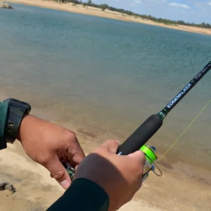 Close-up of the EdgeWalker 66MHT travel rod and spinning reel in use