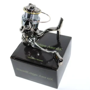ReelEdge AeroX spinning reel handle side, shown on its Yonder Fishing box